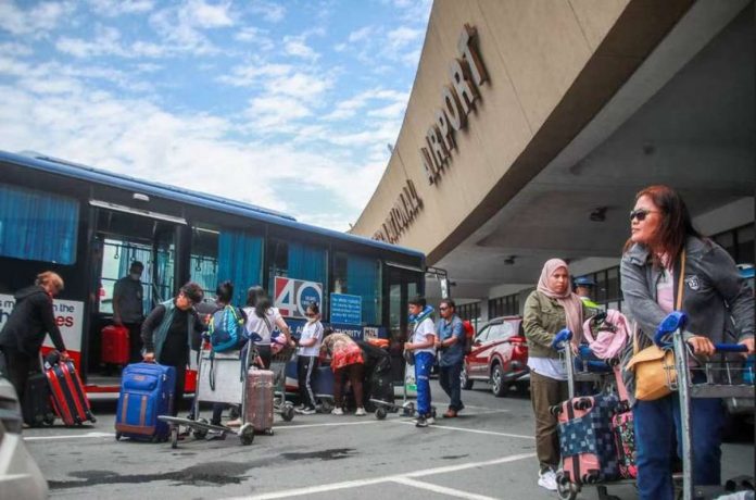 Travelers arrive at the Ninoy Aquino International Airport Terminal 1 in Pasay City. JONATHAN CELLONA/BS-CBN NEWS PHOTO