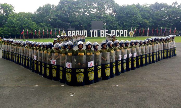 The Quezon City Police District tries to perfect its formations at Camp Karingal in Quezon City in preparation for a Civil Disturbance Management practice. The Philippine National Police is being urged to crack down on local politicians’ use of bodyguards who purportedly carry unlicensed firearms. PNA