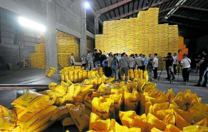 SURPRISE CHECK. Is the explanation for the surging rice prices somewhere here? Officials, including Speaker Martin Romualdez, ACT-CIS Rep. Erwin Tulfo, Bureau of Customs Commissioner Bienvenido Rubio, and Customs Intelligence and Investigation Service chief Alvin Enciso, conduct an unannounced inspection of rice warehouses in Bocaue, Bulacan, on Thursday. NIÑO JESUS ORBETA, PHILIPPINE DAILY INQUIRER