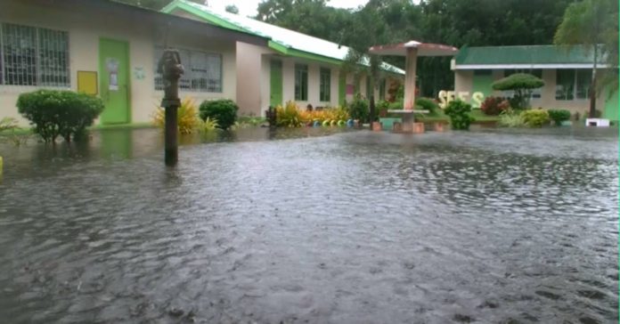 Several areas and schools in Iloilo City, Antique and Guimaras were flooded on Monday, Aug. 28, due to heavy rains brought by the southwest monsoon enhanced by Typhoon “Goring.” File photo shows the flooded grounds of the San Fernando Elementary School in San Jose de Buenavista, Antique. PHOTO COURTESY OF HOPPO RICARZE