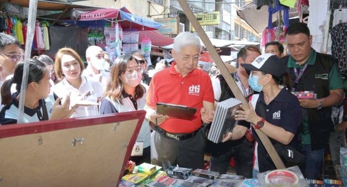 Department of Trade and Industry secretary Fred Pascual conducts a heightened school supplies price monitoring and enforcement operation in Divisoria on Aug. 17. FRED PASCUAL FB PHOTO