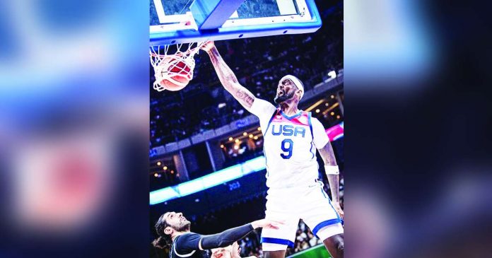 Team USA’s Bobby Portis Jr. scores on a one-handed dunk during their 2023 FIBA Basketball World Cup game against Jordan last night. FIBA PHOTO