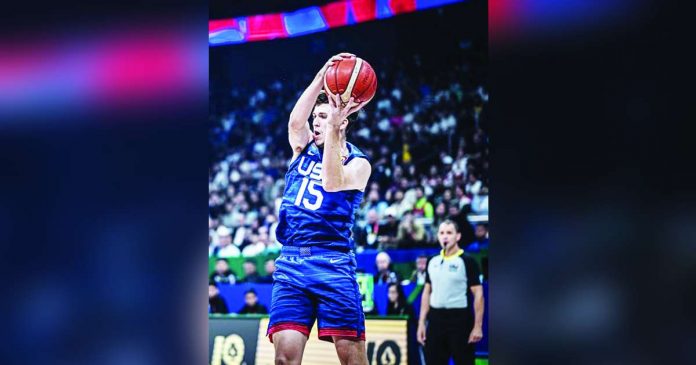 Austin Reaves of Team USA grabs the rebound during their 2023 FIBA Basketball World Cup game against Greece. FIBA PHOTO