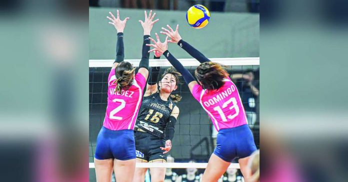 Kurashiki Ablaze’s Tanabe Saki scores against the defense of Creamline Cool Smashers’ Alyssa Valdez and Celine Domingo. PVL PHOTO