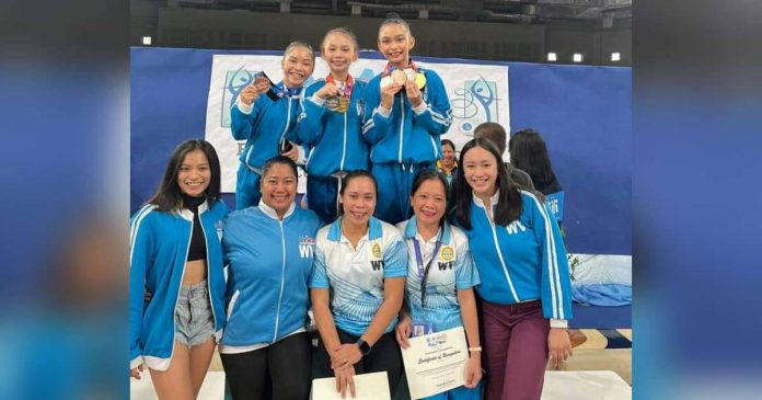 Some of the Negros Occidental-based gymnasts along with their coaches and some former athletes. CONTRIBUTED PHOTO