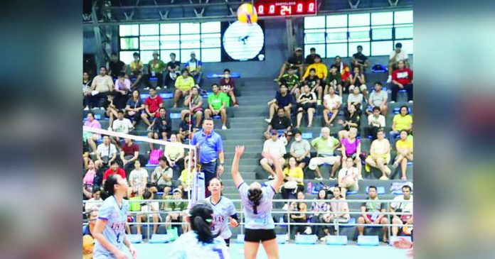 Katherine Shaine Cortez of Western Visayas secondary girls volleyball team tosses the ball high as her teammates look on. PHOTO COURTESY OF DEPED TAYO WESTERN VISAYAS REGION