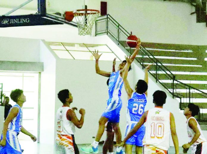 Western Visayas elementary boys basketball team’s Ashton Jarred Buñol grabs the rebound during their 2023 Palarong Pambansa gold medal game against Northern Mindanao. PHOTO COURTESY OF DEPED TAYO WESTERN VISAYAS REGION