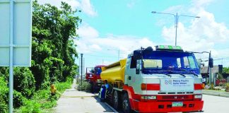 MANAGING WATER SUPPLY. Metro Pacific Iloilo Water says water supply from its bulk supplier is being distributed equitably to customers. It is also increasing its number of water tankers delivering water round the clock. METRO PACIFIC ILOILO WATER PHOTO