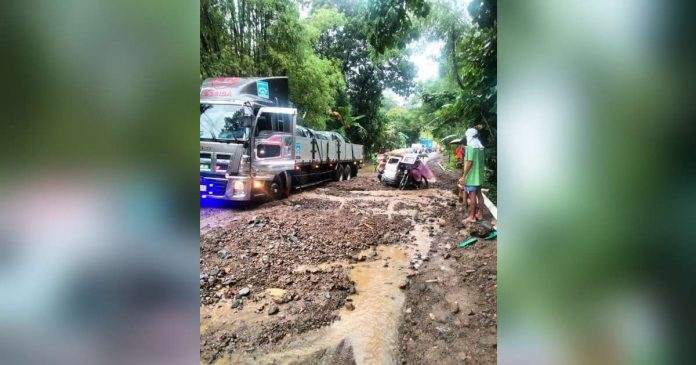 The recurring mudflow hampers motorists passing the Barangay Igbarawan road in Patnongon, Antique. As of yesterday morning, Sept. 17, the road became passable. CHARRY VERTE SONGCAYAWON