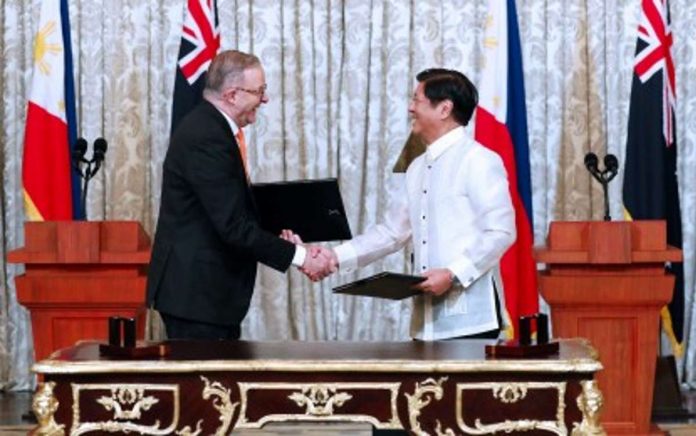 President Ferdinand R. Marcos Jr. and Australian Prime Minister Anthony Albanese shake hands after the signing of the Joint Declaration on Strategic Partnership after their bilateral meeting held at the Reception Hall of Malacañan Palace on Sept. 8, 2023. Under the memorandum of understanding, the Philippines and Australia will grant eligible participants from both countries “Work and Holiday” visa, which will permit them to stay and work in the host country for a period of 12 months. PNA PHOTO BY REY BANIQUET