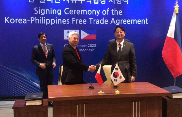 President Ferdinand “Bongbong” Marcos Jr. (left) witnesses the signing of the Philippines-Republic of Korea Free Trade Agreement on Thursday, Sept. 7. PHOTO COURTESY OF GMA NEWS