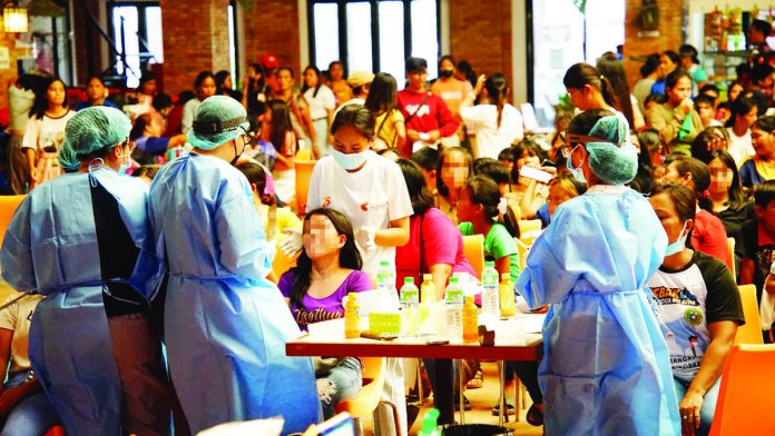 Residents of barangays Semirara, Tinogboc and Alegria in Caluya, Antique gathered at the SMPC Food Court to receive free medical and dental services.