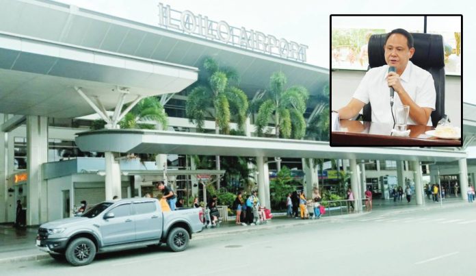 Gov. Arthur Defensor Jr. (inset) says the Iloilo Airport now facilitates 20 flights daily, with each flight carrying roughly 170 to 200 passengers. The airport’s main passenger terminal was originally designed to serve 400 to 450 passengers. PN PHOTO