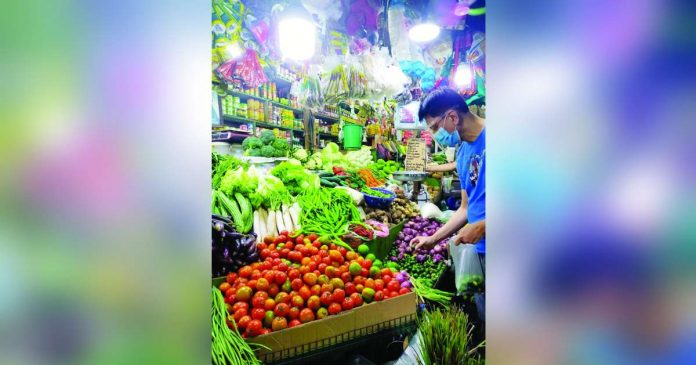 A stall inside the Farmers Market in Cubao, Quezon City sells a wide selection of vegetables. Headline inflation accelerated to 5.3 percent in August from 4.7 percent in July, the Philippine Statistics Authority reported on Tuesday, Sept. 5. TAWILIS, ALIMASAG/CRAB, SEAFOOD SUPPLY FB PHOTO