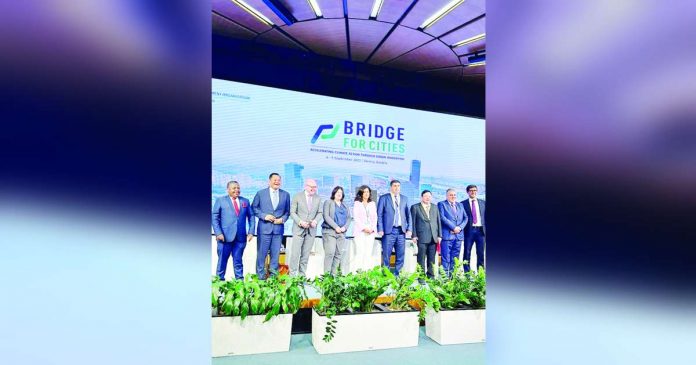 PH REPRESENTATIVE. Iloilo City’s Mayor Jerry Treñas (third from right) is shown here with top local government executives from Germany, the United Kingdom, Slovenia, Armenia, Malawi, Cambodia, Jordan, and the Kyrgyz Republic. They served as panelists at the United Nations Industrial Development Organization’s Bridge for Cities forum on Sept. 5, 2023 in Vienna, Austria. Treñas, the lone local chief executive from the Philippines, highlighted the city’s programs and projects reducing carbon emissions and other climate initiatives.