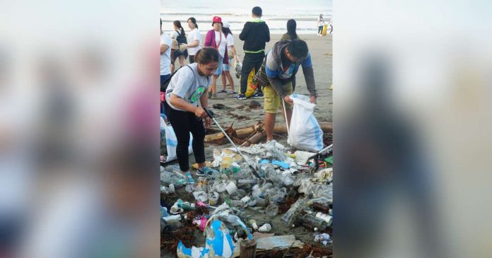 Volunteers segregate and weigh collected trash during the 2023 International Coastal Cleanup held simultaneously throughout the country on Sept. 16. DENR-6