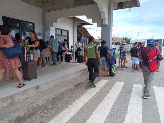 Personnel of the Philippine Drug Enforcement Agency Region 6’s Interdiction Unit conduct random check and paneling inspection at the Caticlan Jetty Port in Barangay Caticlan, Malay, Aklan on Sept. 25. PDEA-6 PHOTO