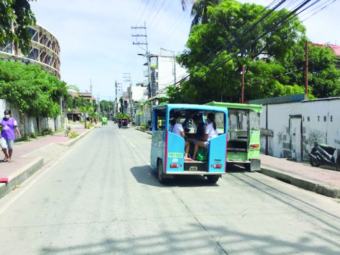 The Malay Transportation Office tells electric tricycle drivers to accommodate students on Boracay Island following complaints of their refusal. BOY RYAN ZABAL/AKEANFORUM