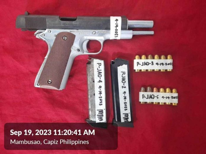 An unlicensed firearm with ammunition was recovered from a man about to enter a court in Mambusao, Capiz on Tuesday, Sept. 19. MAMBUSAO MUNICIPAL POLICE STATION PHOTO