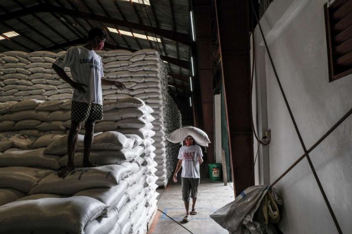 The Department of Finance proposes "the reduction of the 35 percent rice import tariff rates temporarily to 0 percent or maximum of 10 percent to arrest the surge in rice prices." VEEJAY VILLAFRANCA/BLOOMBERG PHOTO