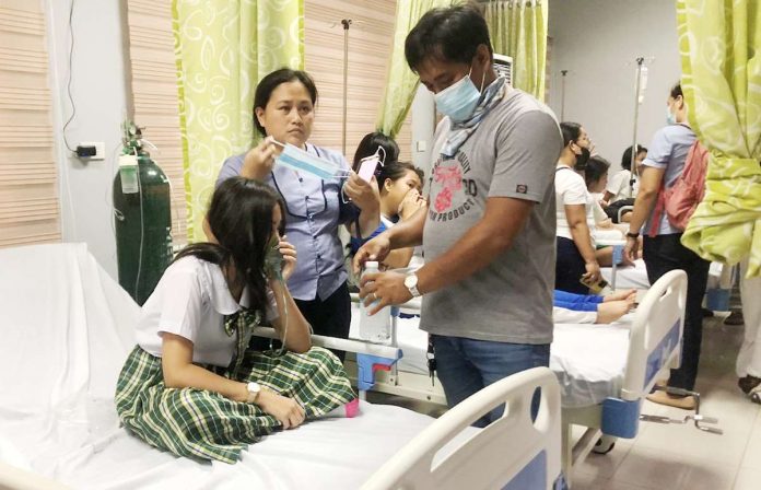 Students suffering from “vog” were rushed to Tuy, Batangas Rural Health Unit on Thursday. PHOTO BY TUY MDRRMO