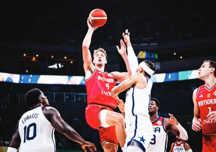 Germany’s Franz Wagner goes for a running shot against the defense of United States’ Josh Hart. FIBA PHOTO
