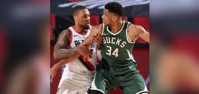 Damian Lillard and Giannis Antetokounmpo are now teammates at the Milwaukee Bucks. GETTY IMAGES