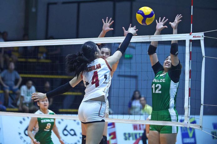 College of St. Benilde Lady Blazers’ Corrine Apostol attempts to block the shot attempt of Enderun College Lady Titans' Chrizel Aguilar. V-LEAGUE PHOTO