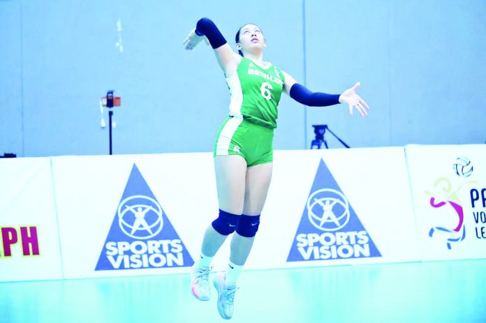 College of St. Benilde Lady Blazers’ Zen Basilio prepares to set the ball during their 2023 V-League Women’s Collegiate Challenge game against Mapua University Lady Cardinals. V-LEAGUE PHOTO