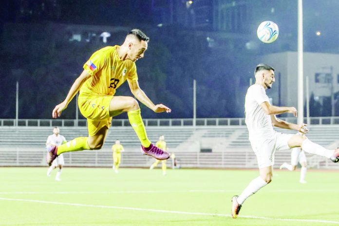 Philippine Azkals’ Patrick Reichelt kicks the ball up during their international friendly match against Afghanistan. PFF PHOTO