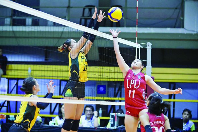 Negrense Kiesha Bedonia of Far Eastern University Lady Tamaraws foils the attack of Lyceum Lady Pirates’ Kareina Galedo. V-LEAGUE PHOTO