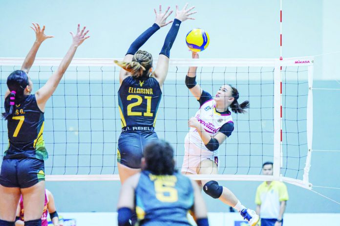 University of Perpetual Help Lady Altas’ Shaina Omipon evades a Far Eastern University Lady Tamaraws defender for a drop hit. V-LEAGUE PHOTO