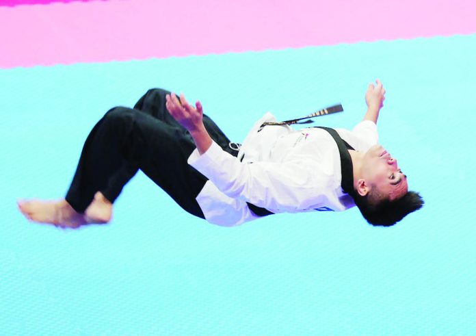 King Patrick Perez performs during the 19th Asian Games on Sunday. PHOTO COURTESY OF POC