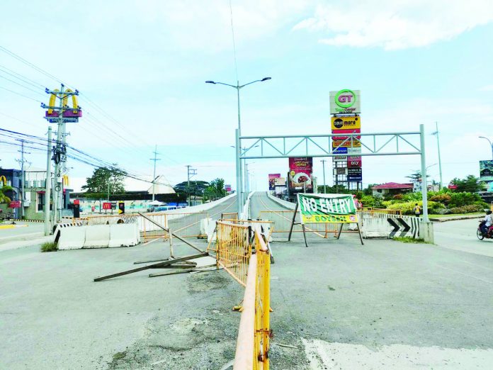 The Department of Public Works and Highways allots an initial P200-million budget for the repair of the Ungka flyover so that the idle infrastructure can be used as soon as possible. AJ PALCULLO/PN