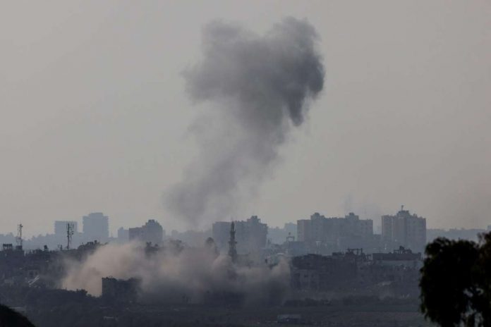 Smoke is seen rising in Gaza from a viewpoint in Southern Israel on Oct. 23, 2023. REUTERS/VIOLETA SANTOS MOURA