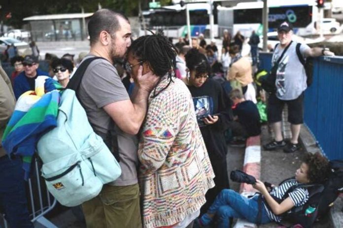 American citizens gather at the port of Haifa as they await word on their evacuation to Cyprus amid the fighting between Israel and Hamas. AFP PHOTO