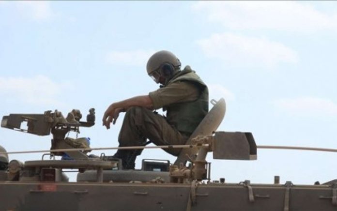 The Israeli army has deployed dozens of tanks and armored vehicles along with military members to the Gaza border area in Sderot, Israel on Friday, Oct. 13. Israeli Prime Minister Benjamin Netanyahu said the offensive is “just the beginning” and “we are striking our enemies (Hamas) with unprecedented force.” PHOTO COURTESY OF ANADOLU