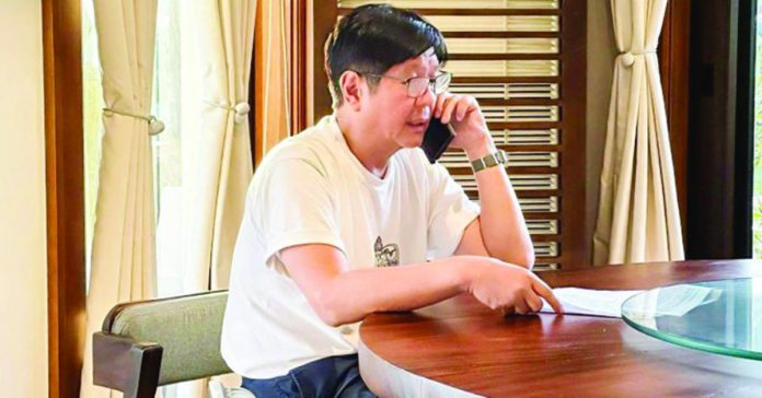 President Ferdinand R. Marcos Jr. speaks with the sister of Negrense overseas Filipino worker Loreta Villarin Alacre, the third Filipino killed in Israel, in a phone call on Sunday, Oct. 15. Marcos assured the grieving family of the government’s complete support, emphasizing efforts to repatriate Alacre’s remains. PRESIDENTIAL COMMUNICATIONS OFFICE PHOTO