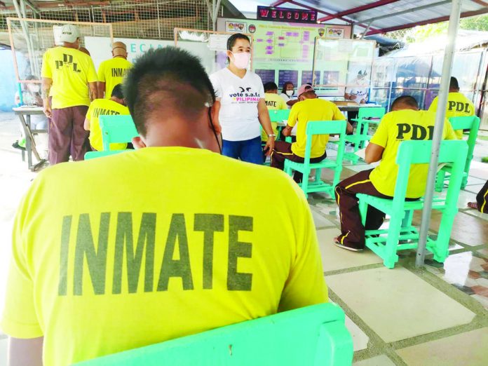 Persons deprived of liberty at the Bureau of Jail Management and Penology in Barangay Nanga, Pototan casting their votes during the May 9, 2022 national elections. PN FILE PHOTO