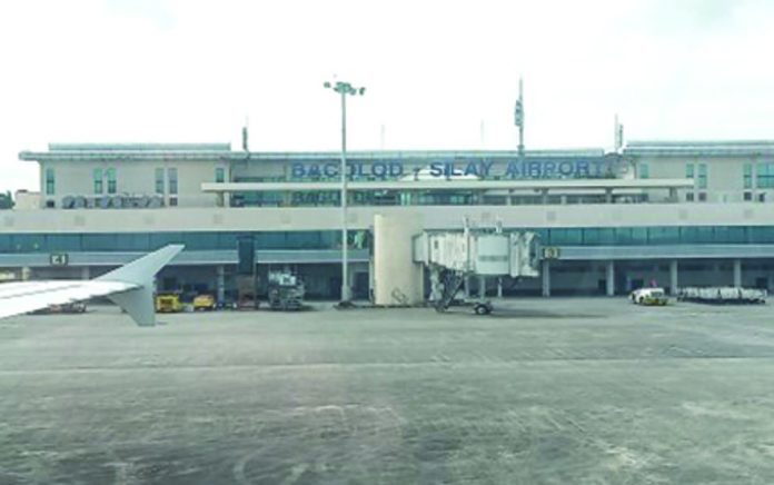 The Bacolod City Government is verifying the report that aircraft of Korean Air cannot land at Bacolod-Silay Airport because of its short runway. Photo shows the runway and terminal building of Bacolod-Silay Airport. PNA BACOLOD FILE PHOTO