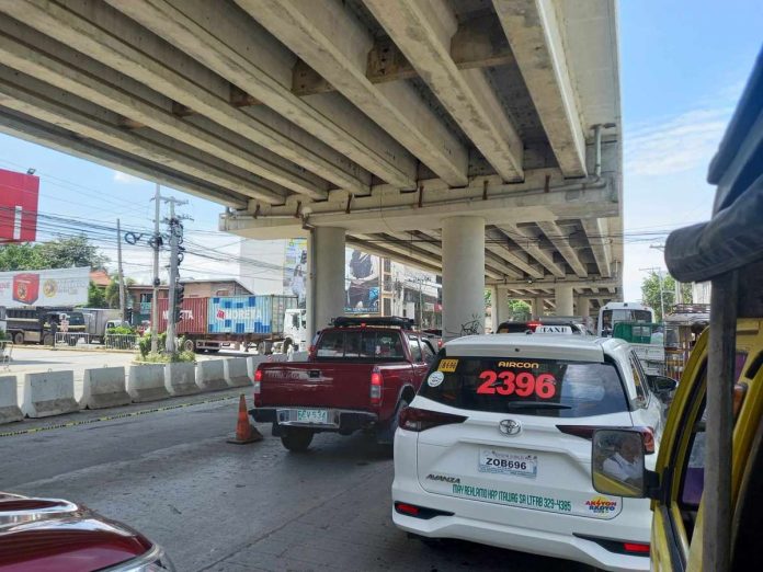 The Department of Public Works and Highways Region 6 stations survey teams beneath the Ungka flyover to primarily monitor any movements, especially on piers 4, 5, and 6. PN PHOTO