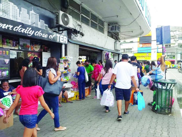 The proposed wage increase in Western Visayas has seen little resistance from the local business community. Photo shows the busy J.M. Basa Street in Iloilo City’s downtown area. PN FILE PHOTO