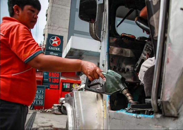 Public utility jeepney drivers line up to refuel at a gasoline station. JONATHAN CELLONA/ABS-CBN NEWS PHOTOPublic utility jeepney drivers line up to refuel at a gasoline station. JONATHAN CELLONA/ABS-CBN NEWS PHOTO