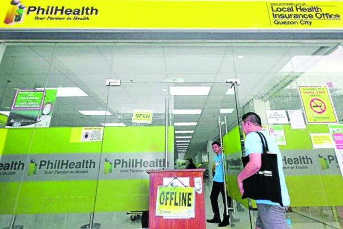 PhilHealth’s operations revert to manual after its website and computer systems were hacked on Sept. 22 2023. PHOTO BY GRIG C. MONTEGRANDE, PHILIPPINE DAILY INQUIRER