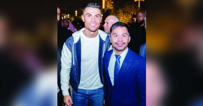 Manny Pacquiao meets football star Cristiano Ronaldo during a pre-match event for a boxing match in Riyadh, Saudi Arabia on Oct. 28. @MANNYPACQUIAO/INSTAGRAM PHOTO