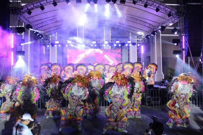 MassKara dancers in colorful festival costumes perform during the grand countdown, or “salubong,” on Friday, Oct. 6, at the Bacolod City Government Center grounds. BACOLOD CITY TOURISM OFFICE