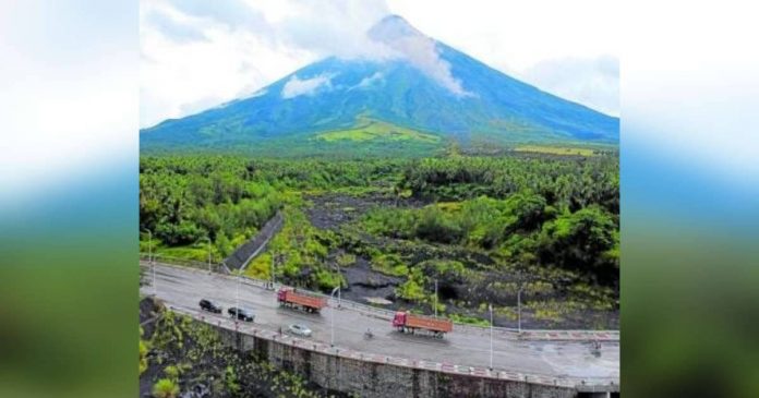 Villages in areas identified as high-risk for lahar from Mayon Volcano are advised to be ready, especially during the typhoon season, as heavy and continuous rains may generate lahar flows along significant channels. This image of Mayon was taken from Barangay Mabinit in Legazpi City on July 21, 2023. MARK ALVIC ESPLANA, PHILIPPINE DAILY INQUIRER