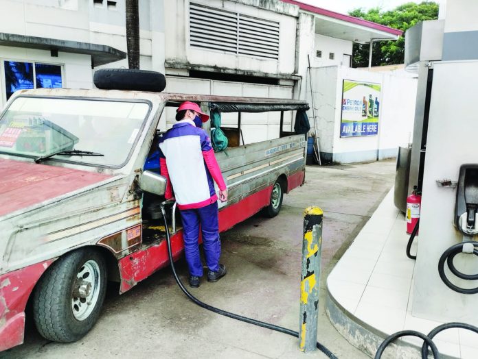 Gasoline prices will go down by P2 per liter while diesel will increase by P0.50 per liter today. PN PHOTO