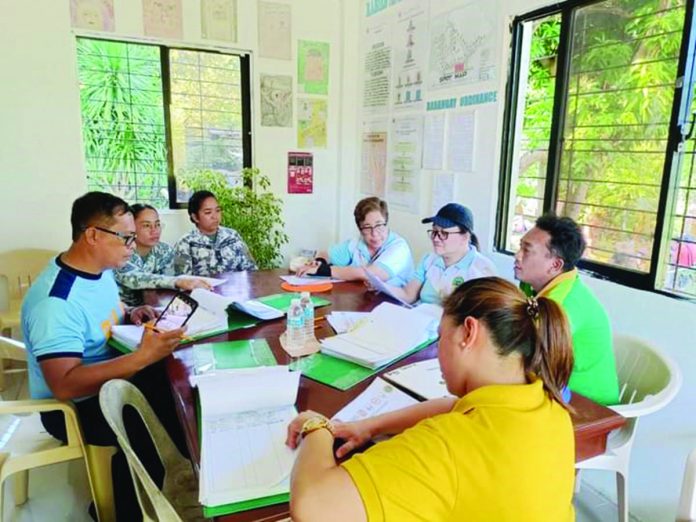 The Sub-National Rabies Control Committee Technical Working Group deliberates the rabies-free status of Naborot Island in San Dionisio, Iloilo on Wednesday, Oct. 18. PROVINCIAL VETERINARY OFFICE PHOTO