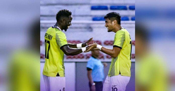 Kaya Futbol Club-Iloilo’s Robert Lopez Mendy celebrates with Daizo Horikoshi after scoring a goal in their quarterfinals encounter. PHOTO COURTESY OF KAYA-ILOILO